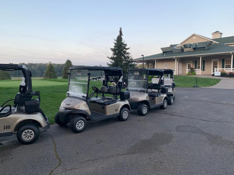 Golf carts lined up at the clubhouse during the MEECA golf outing.