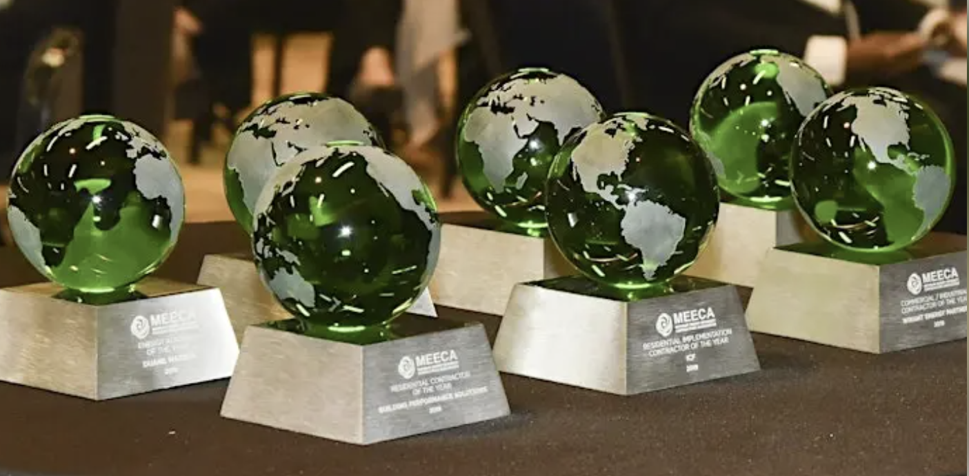 MEECA award trophies presented at an industry recognition event.