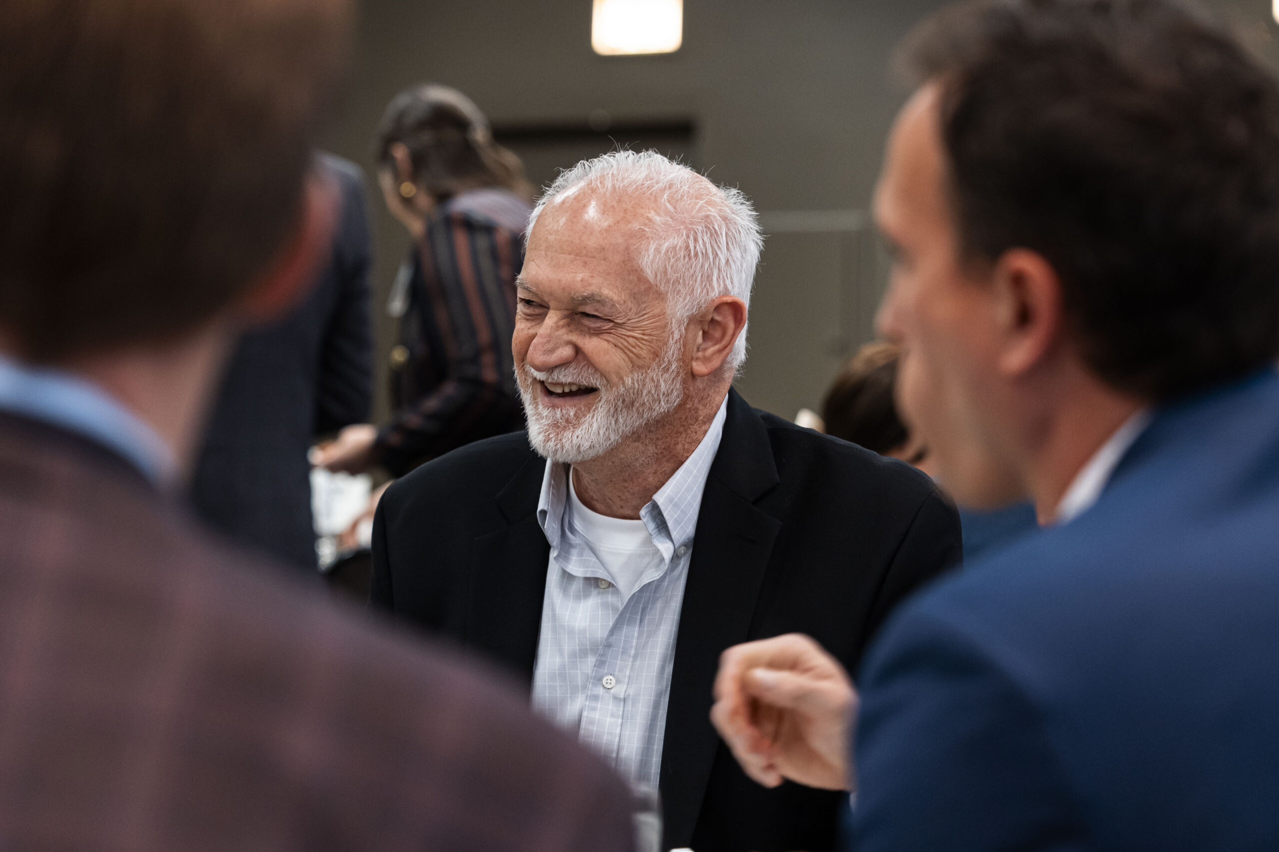 MEECA members sharing a laugh while networking at the MEECA award ceremony.